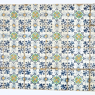 Een veld van 24 polychrome Delftse tegels met ornament decor, 17e eeuw